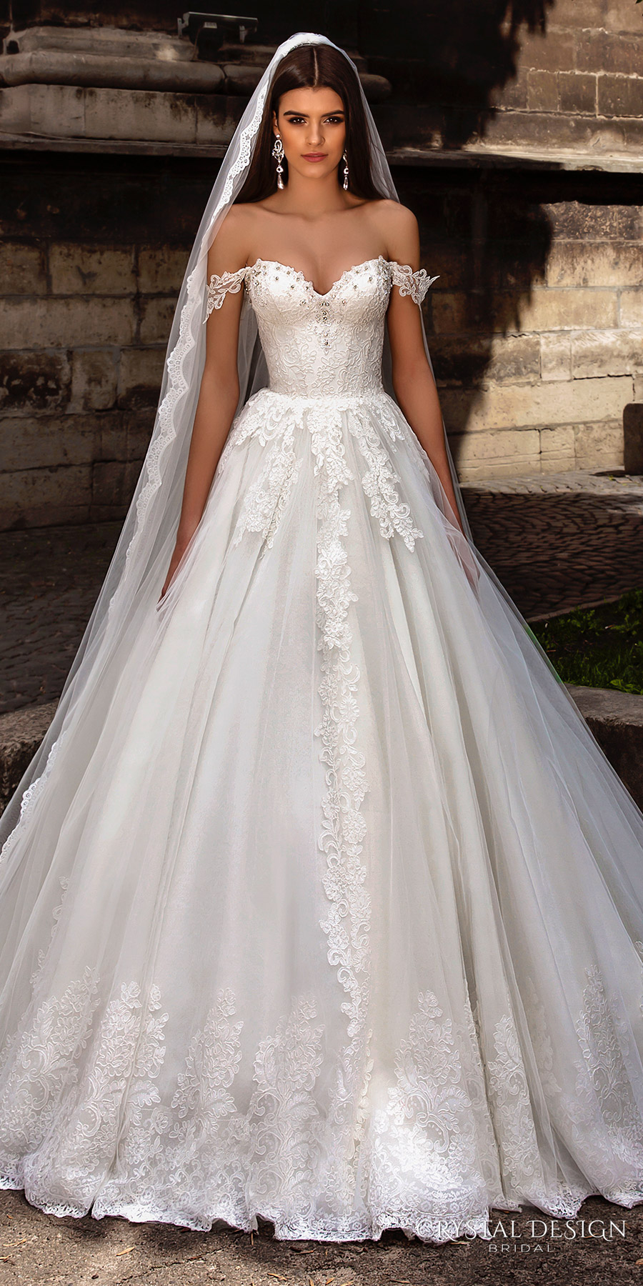 Princess wedding dress with heavily embellished bodice and full skirt
