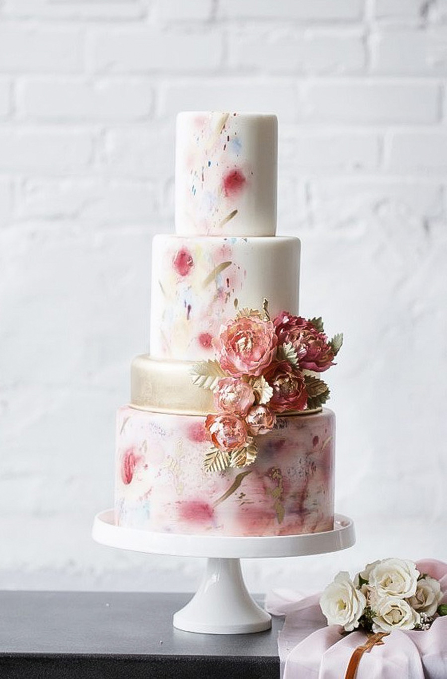white 3 4 tier pink floral print gold accent wedding cake (14) mv
