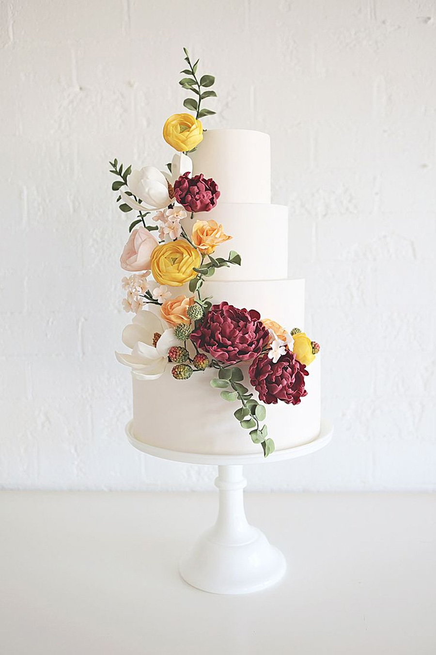 white 4 tier red yellow white cascading floral wedding cake (23) mv