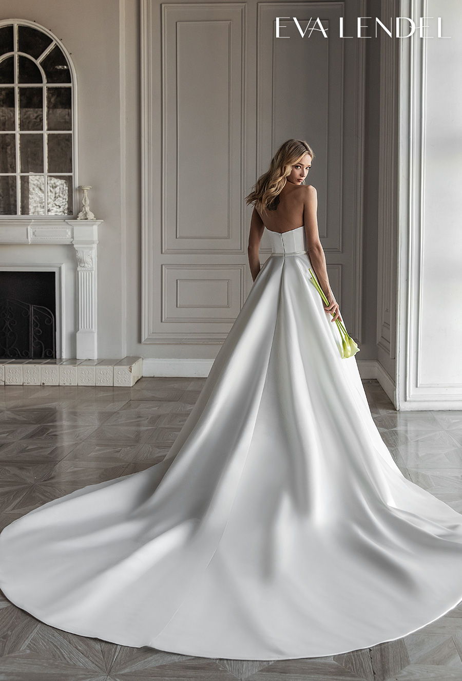 https://www.weddinginspirasi.com/wp-content/uploads/2020/07/eva-lendel-2021-bridal-strapless-sweetheart-neckline-simple-button-front-romantic-a-line-wedding-dress-with-pockets-mid-back-royal-train-diora-bv.jpg