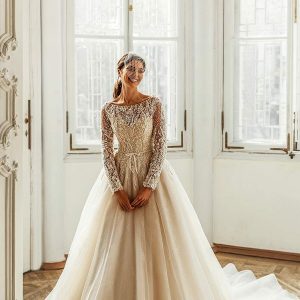 luce sposa 2021 shades of couture bridal long sleeve bateau neckline heavily embellished bodice a line ball gown wedding dress cathedral train champagne (charlotte) mv