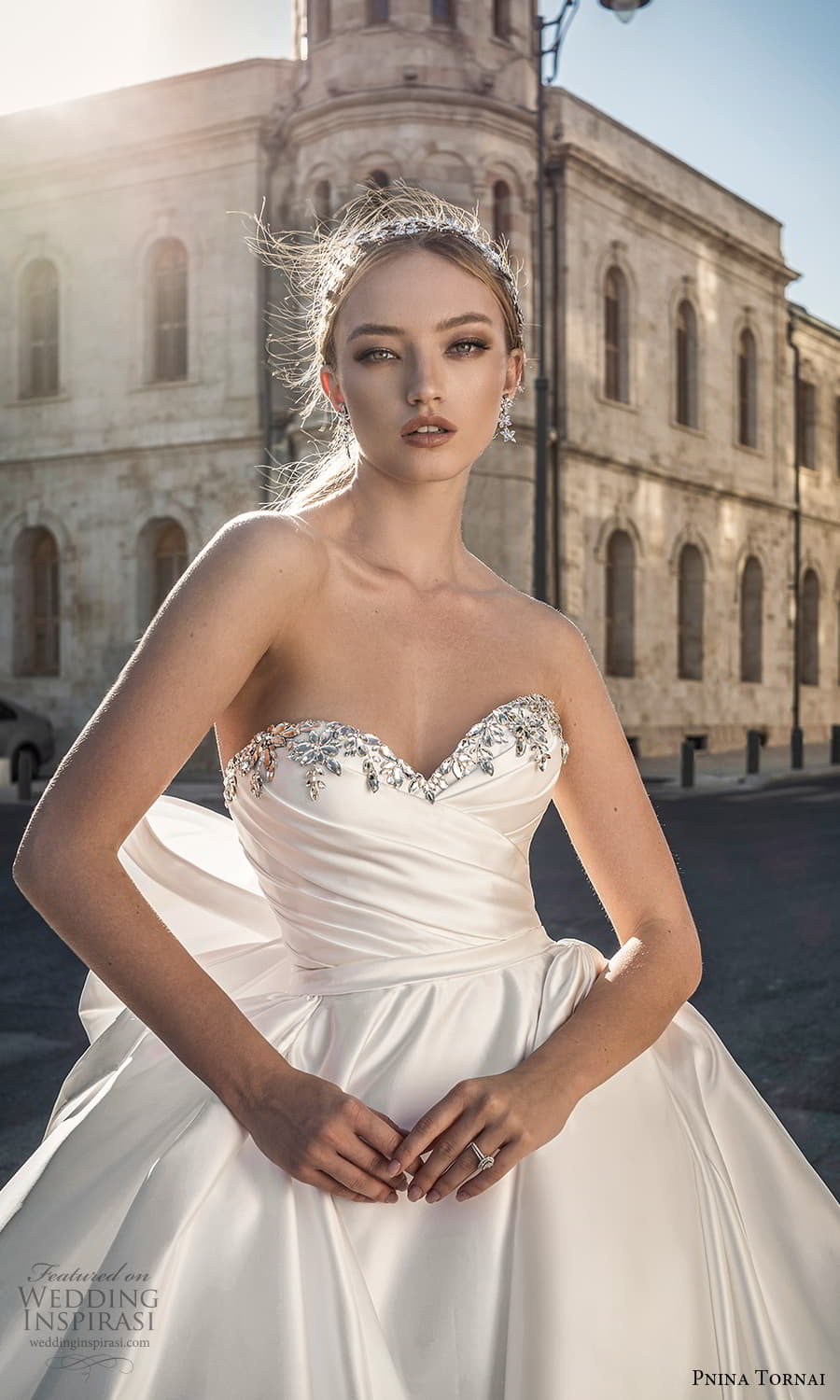pnina tornai 2022 love bridal strapless embellished sweetheart neckline ruched bodice minimalist a line ball gown wedding dress chapel train bow back (3) zv