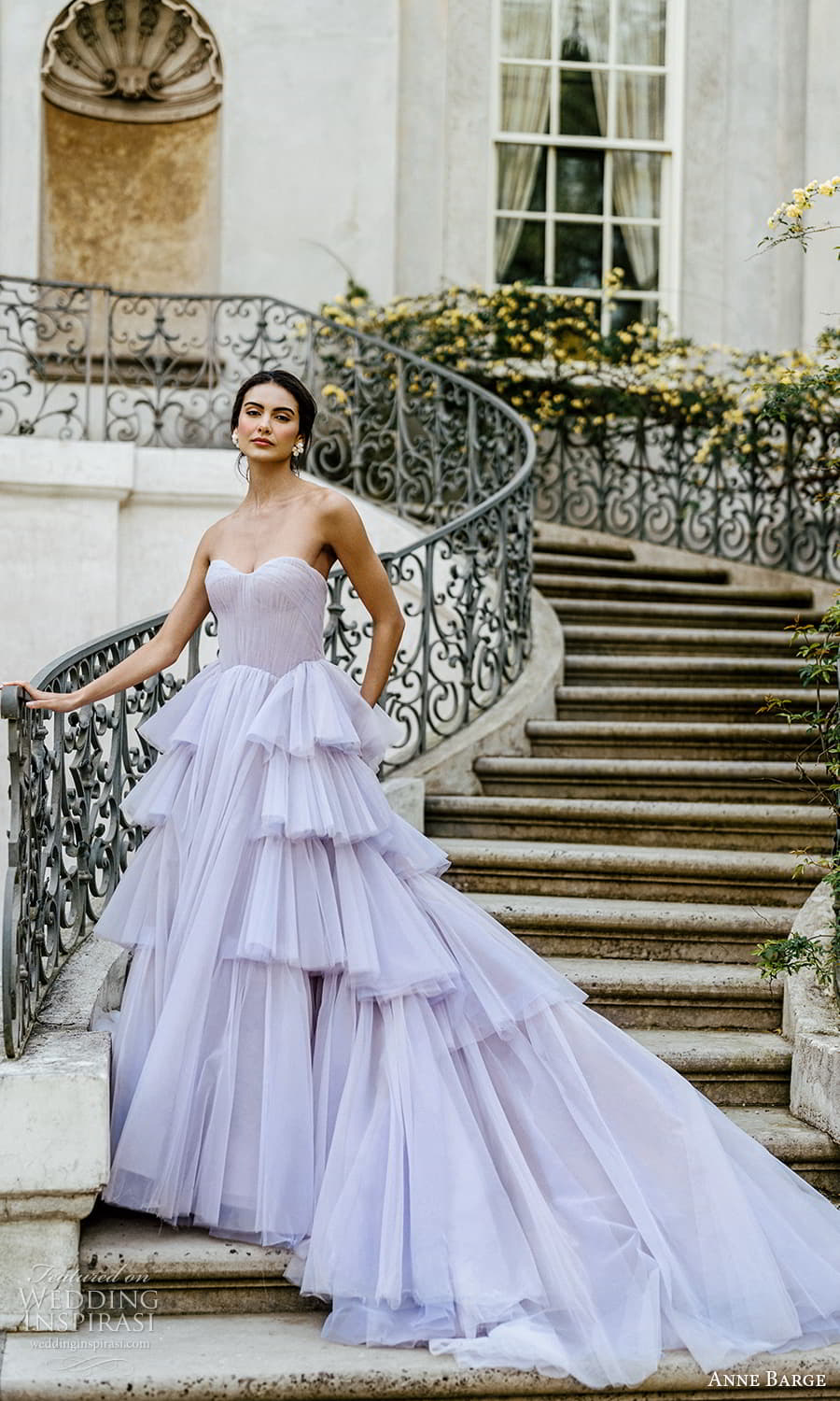 https://www.weddinginspirasi.com/wp-content/uploads/2023/04/anne-barge-spring-2024-bridal-strapless-sweetheart-neckline-a-line-ball-gown-wedding-dress-tiered-skirt-chapel-train-lavender-purplr-color-1-mv.jpg