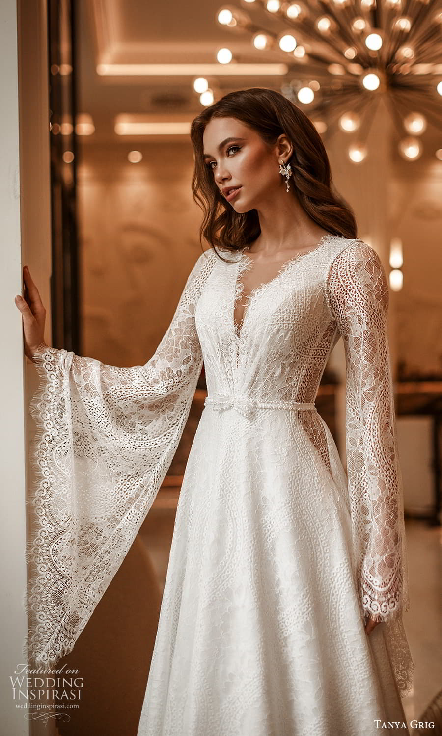 tanya grig 2025 bridal long flare sleeves eyelash lace v neckline belt side cutoout a line wedding dress chapel train (17) mv