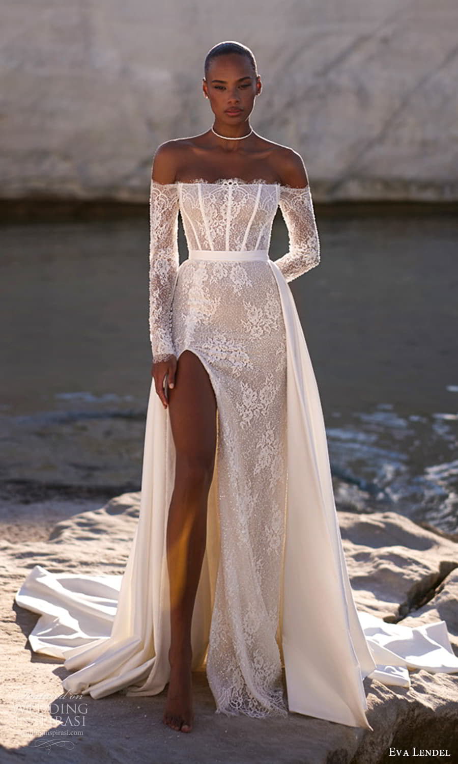 eva lendel fall 2025 bridal off shoulder long sleeves strapless straight across neckline lace sheath wedding dress high slit skirt a line overskirt chapel train (27) mv