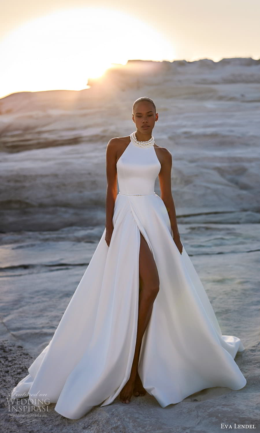 eva lendel fall 2025 bridal sleeveless halter neckline clean minimalist elegant modern ball gown a line wedding dress slit skirt chapel train (30) mv